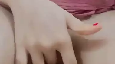 Nude Bhabhi presses boobs and fingers her pussy