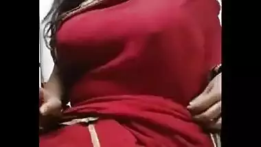 In this sex clip Desi hottie flashes juicy XXX melons while smoking