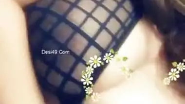 Indian babe's breasts are so big that she can easily lick nipples