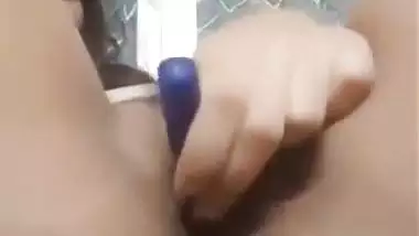 Nude desi girl fucks her holes with fingers and pens.