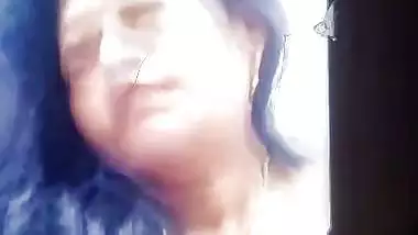 MILF horny expression with big boobs showing